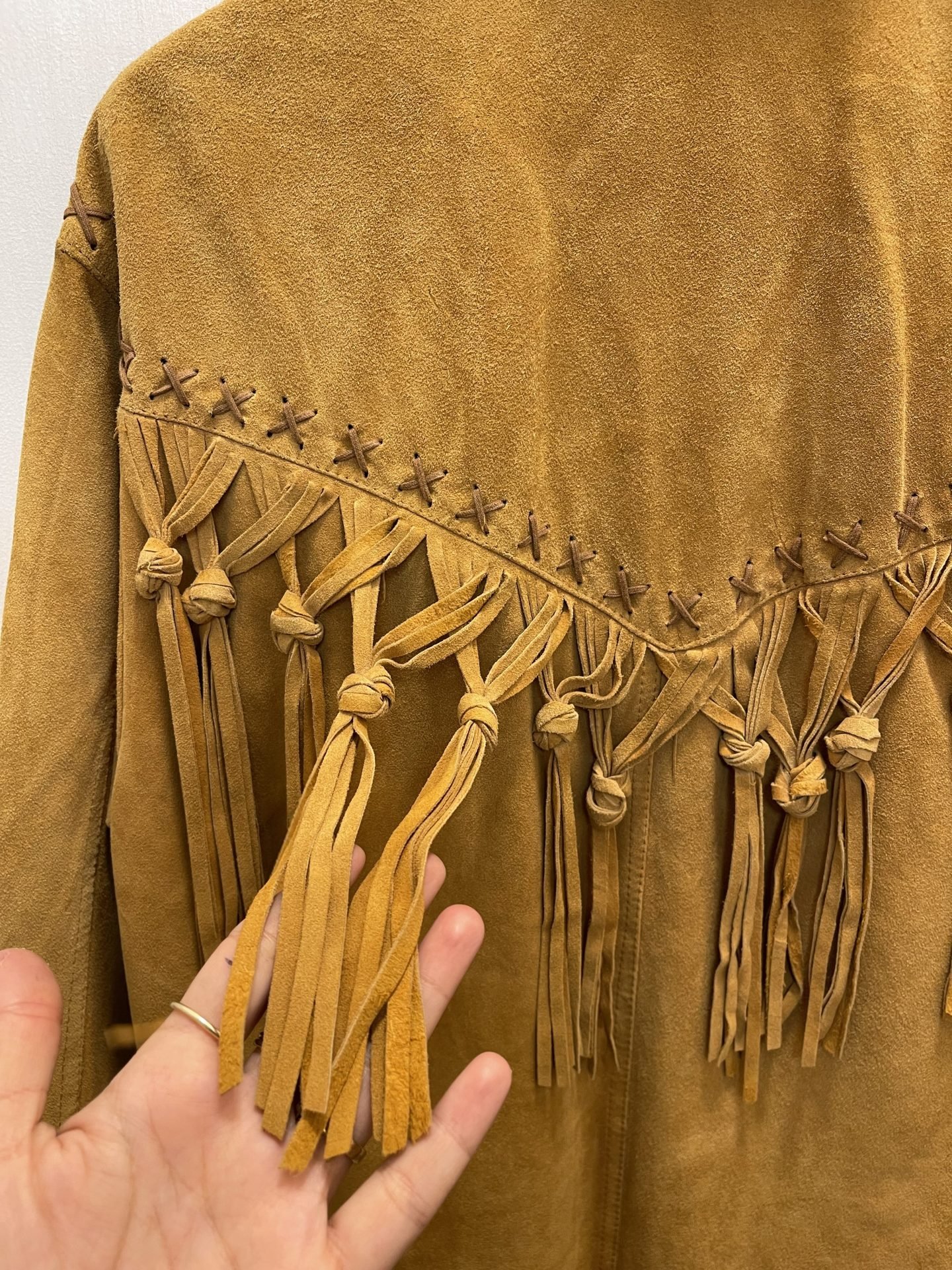 Giacca scamosciata con frange