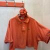 Polo Lacoste arancione crop + Scrunchies